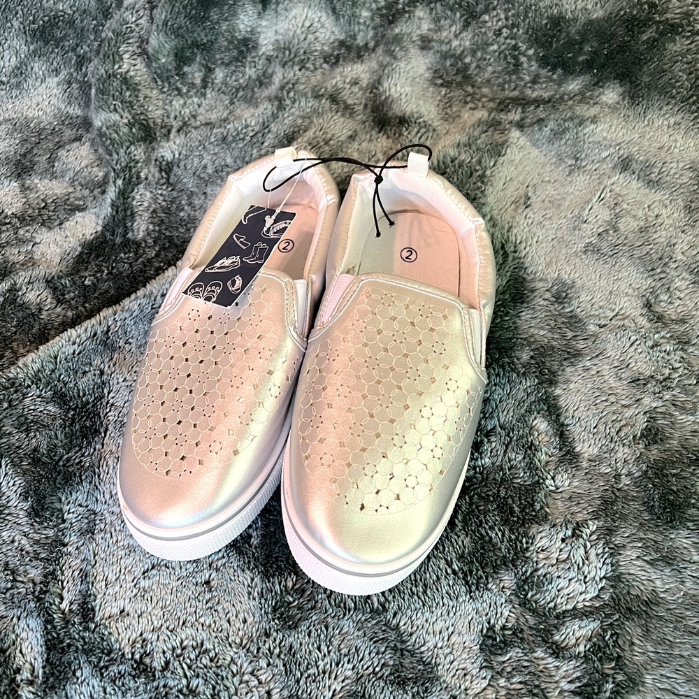 Silver with flower patten slip on girls shoes size 2 gifted tag on never worn